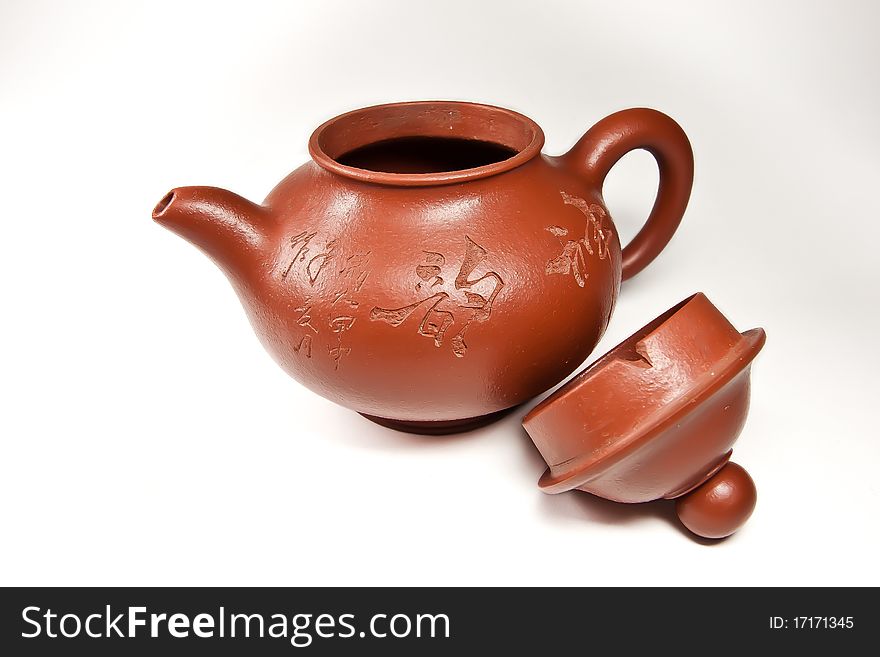The Chinese ceramic teapot on a white background. The Chinese ceramic teapot on a white background
