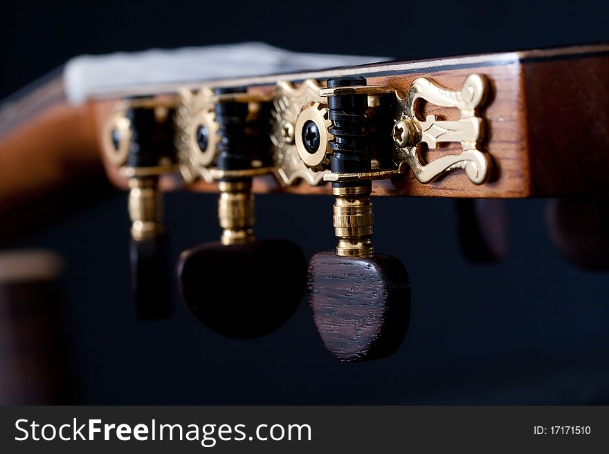 Neck of a guitar isolated on white. Neck of a guitar isolated on white