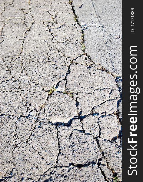 Cracked road flooring texture background