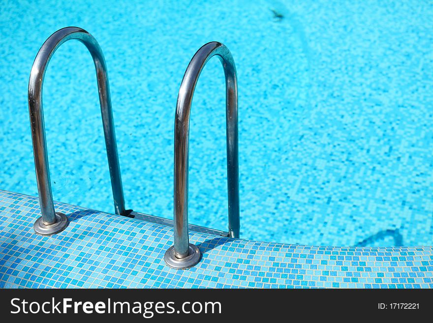 Picture of swimming pool with blue water. Picture of swimming pool with blue water