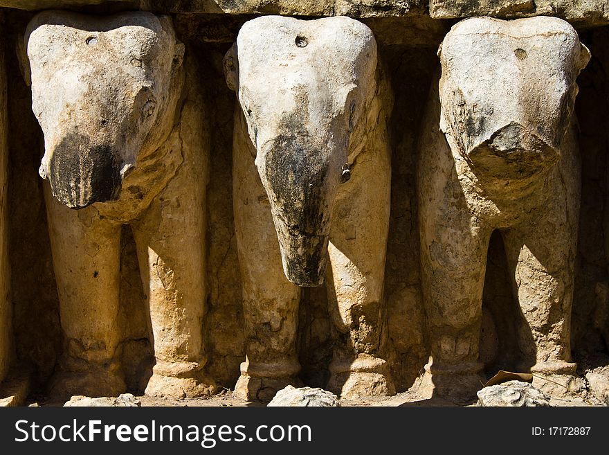 Ancient and broken sculpture of three elephant in the wall in the Historic Park of Thailand. Ancient and broken sculpture of three elephant in the wall in the Historic Park of Thailand