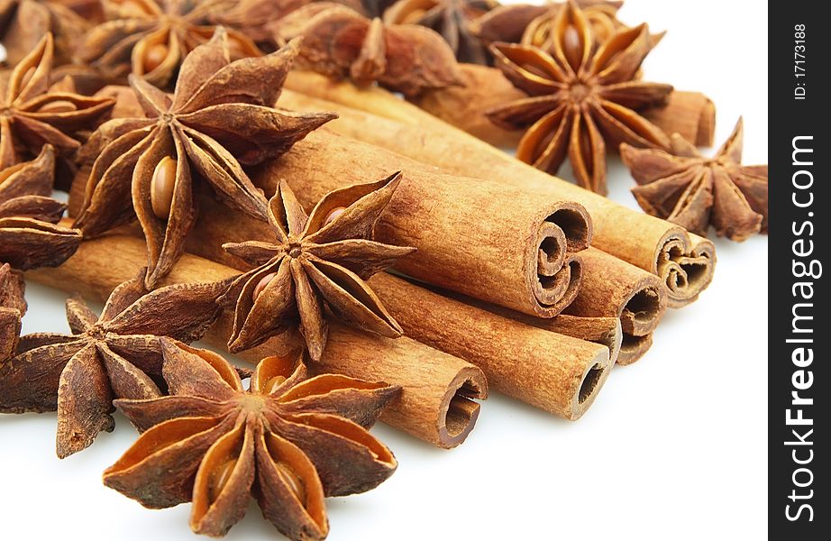 Anise and cinnamon on a white background