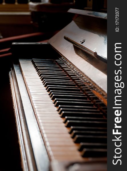 Close up of a wooden piano keyboard. Close up of a wooden piano keyboard