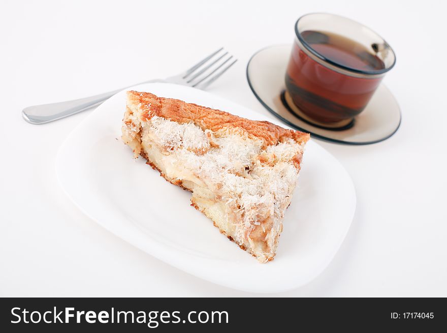 Apple pie and a cup of tea on a white background