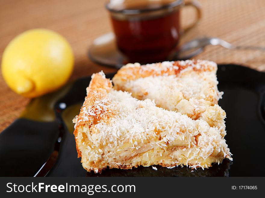 Apple pie and a cup of tea on a white background