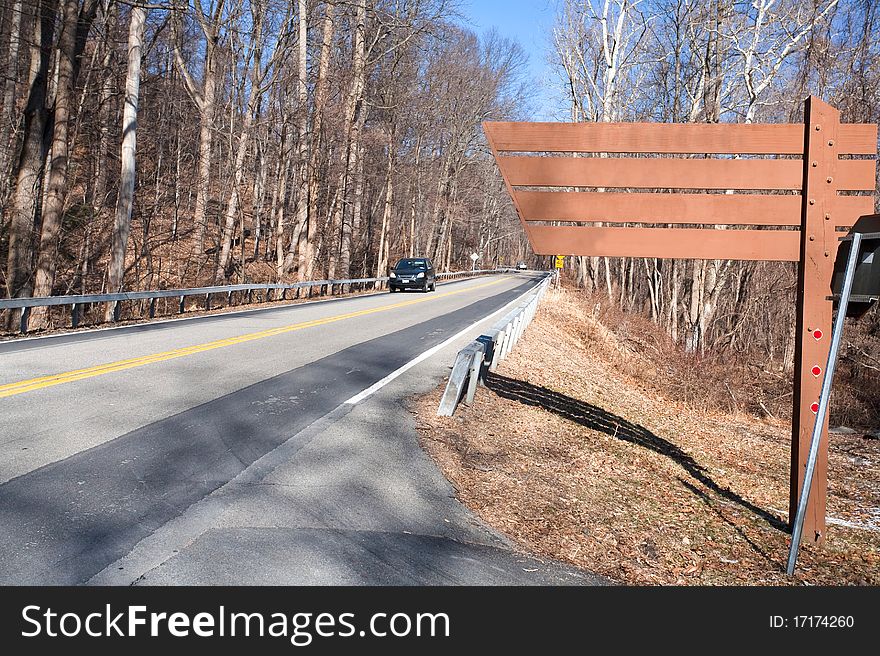 Wooden road sign in Croton park