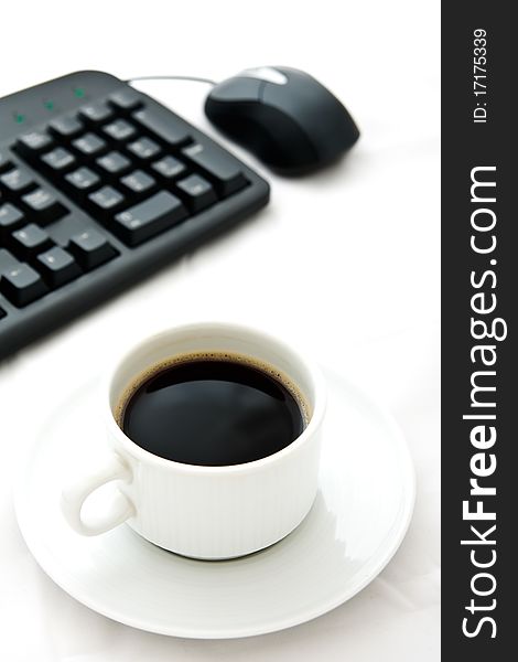 White Coffee Cup And Black Keyboard