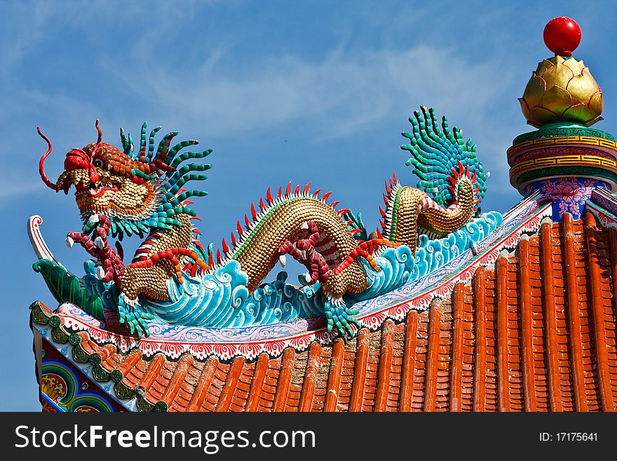 Dragon Statue On Chinese Style Roof
