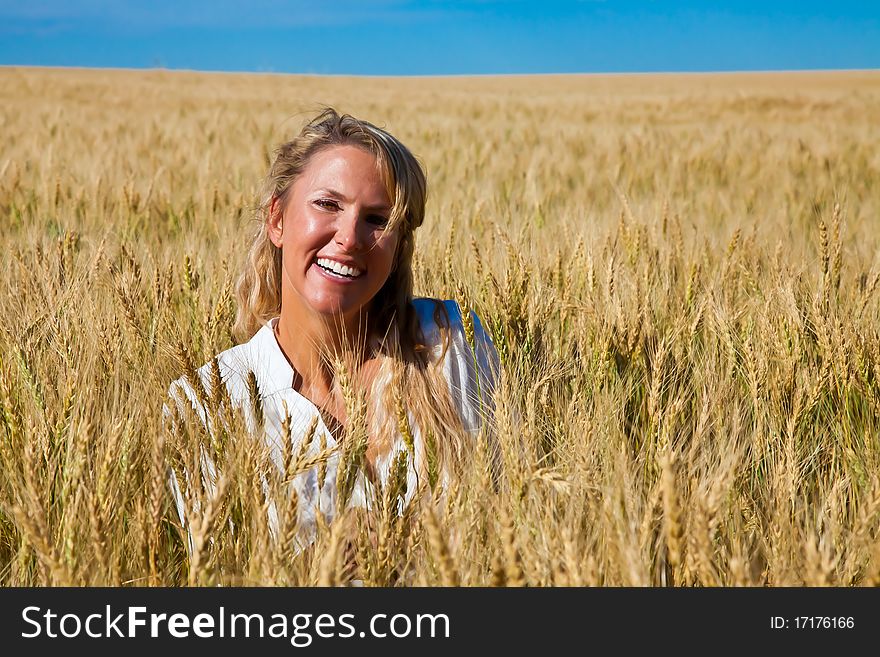 Woman In Wheat Field