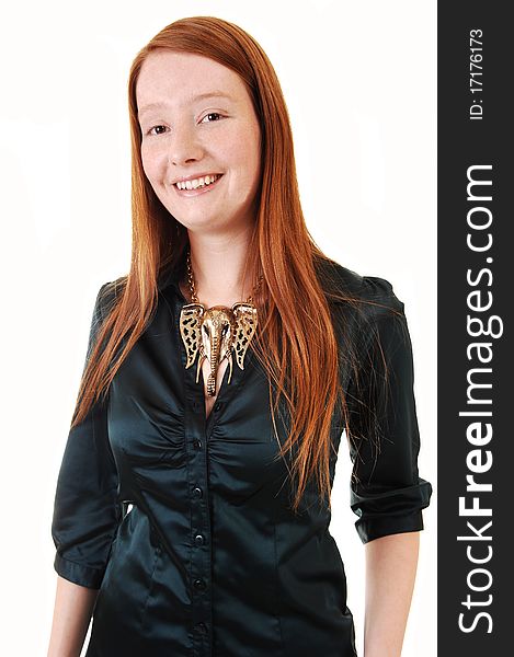 A pretty woman with long red hair and a elephant head necklace and green blouse, smiling in a portrait shot for white background. A pretty woman with long red hair and a elephant head necklace and green blouse, smiling in a portrait shot for white background.