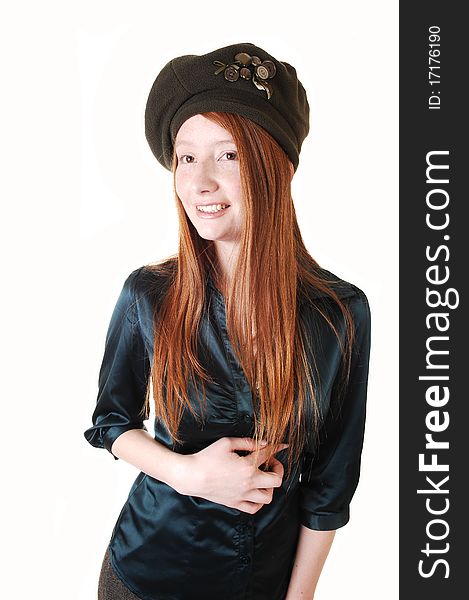 A young pretty woman with long red hair in a green blouse wearing
a hat with buttons on, for white background. A young pretty woman with long red hair in a green blouse wearing
a hat with buttons on, for white background.