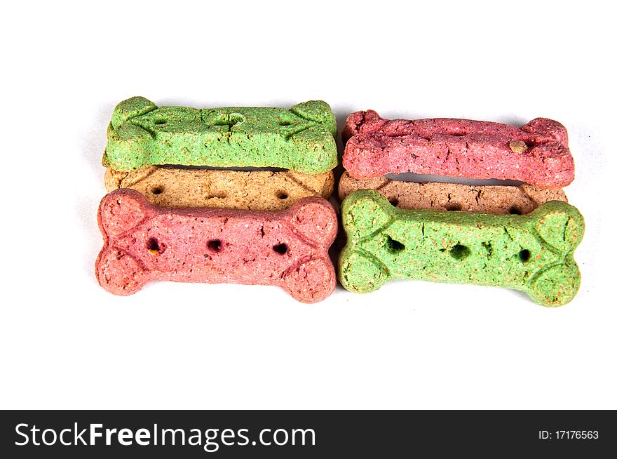 Multicolored dog treat biscuits, isolated on white