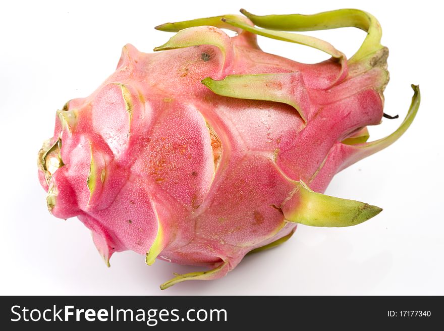 Closeup on whole and half of Dragon fruit
