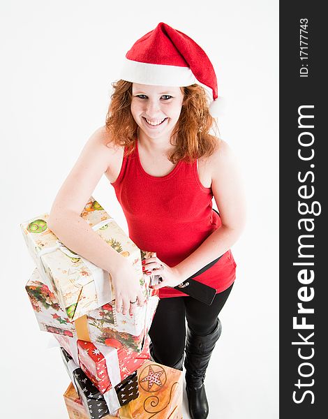 Beautiful red hair teen girl in santa costume. Beautiful red hair teen girl in santa costume