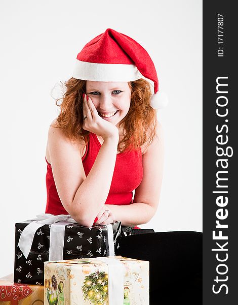 Beautiful red hair teen girl in santa costume. Beautiful red hair teen girl in santa costume