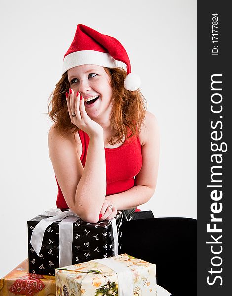 Beautiful red hair teen girl in santa costume. Beautiful red hair teen girl in santa costume