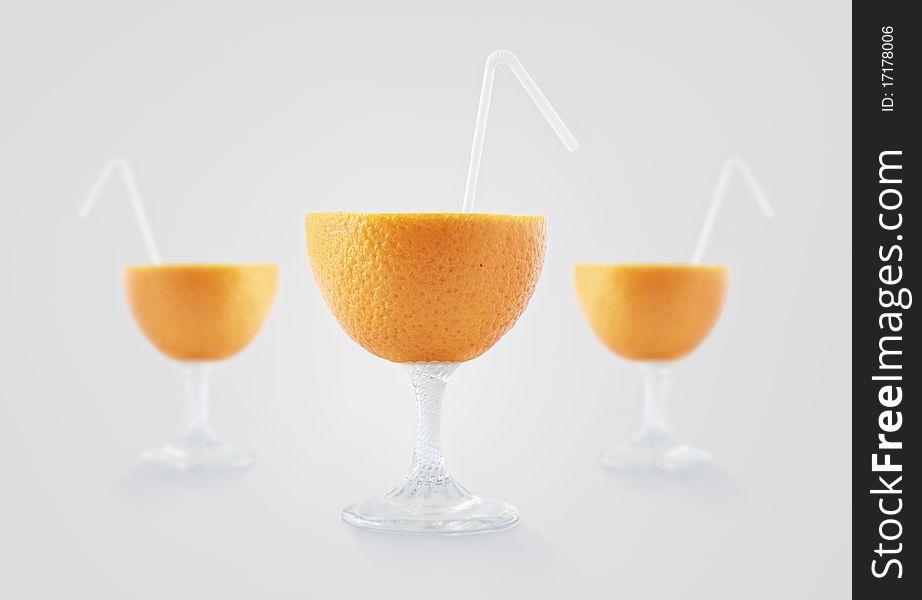 Glass look orange fruit with straw. Glass look orange fruit with straw