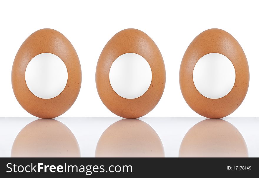 Three eggs labeled with blank white paper. Three eggs labeled with blank white paper