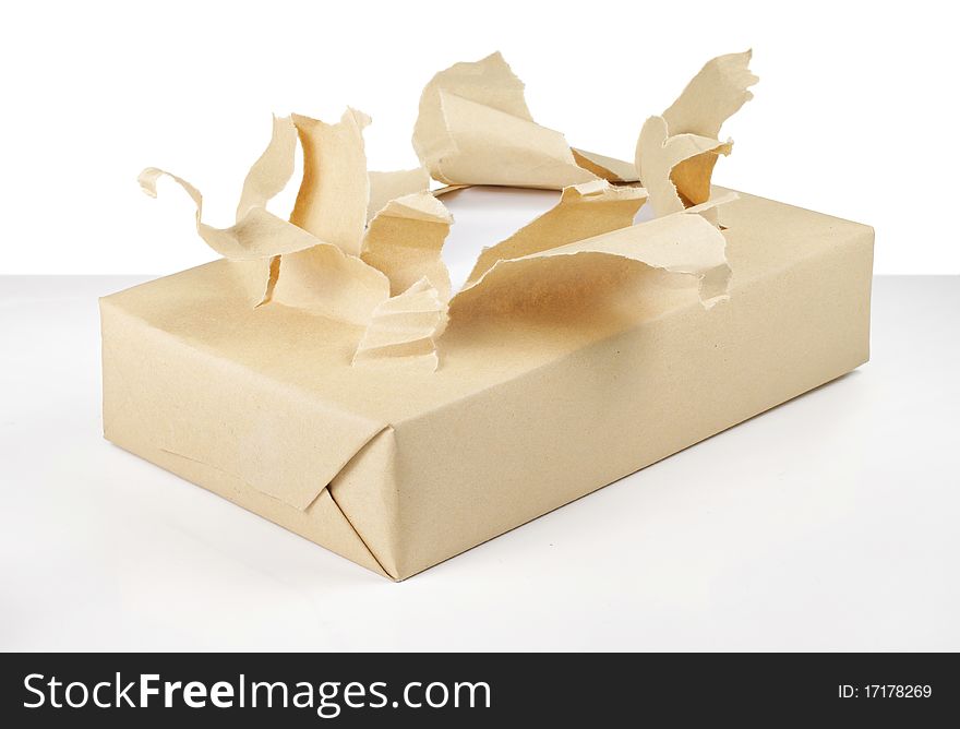 Brown paper cardboard box package torn. Brown paper cardboard box package torn