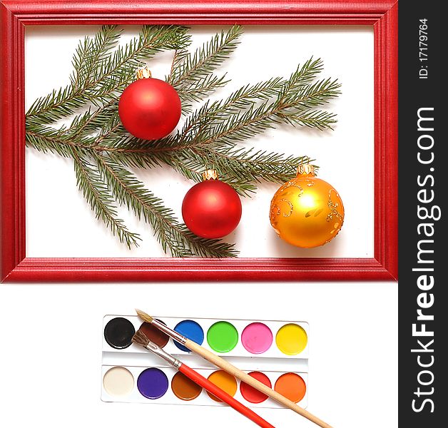 Christmas balls in wood frame on white background