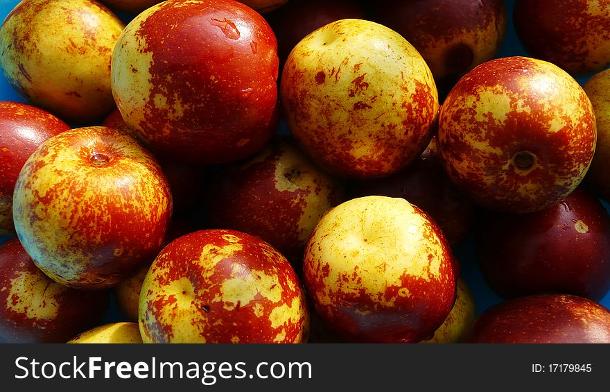 Closeup view of a pile of sweet Chinese date(or jujube) in autumn.