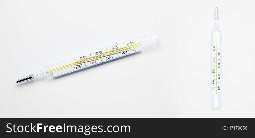 Two thermometer on white background