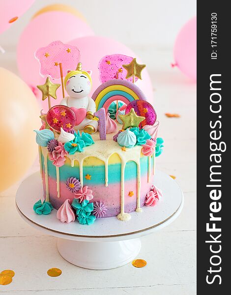 Party cake with unicorn for first birthday