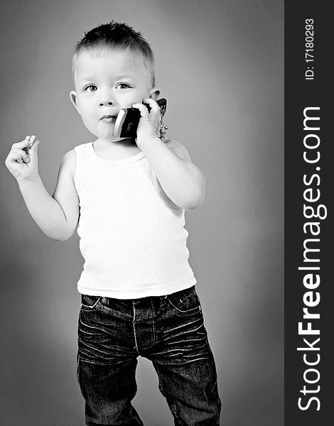 Little boy talking on the phone