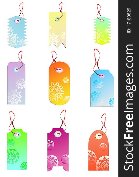 A set of blank tags with red string decorated with snowflakes or stylized flowers isolated on white with shadow. A set of blank tags with red string decorated with snowflakes or stylized flowers isolated on white with shadow