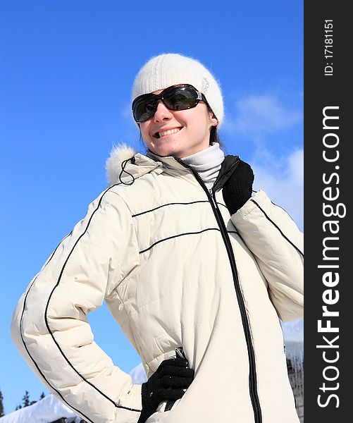 Young woman enjoying winter sunny day