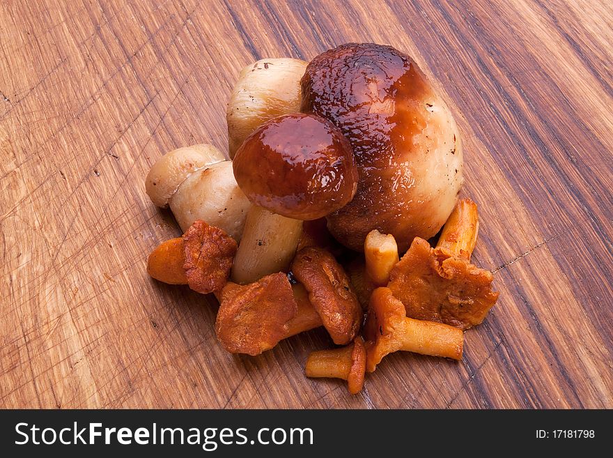 Bunch of mushrooms on a wooden board
