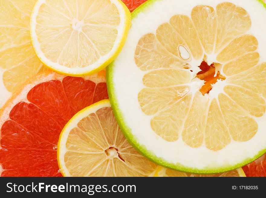 Fresh Grapefruit And Slices Background