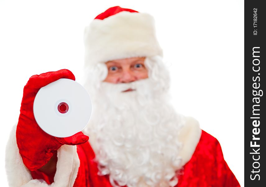 Close up of Santa Claus with a CD isolated on white. Sharpness on the CD. Close up of Santa Claus with a CD isolated on white. Sharpness on the CD.