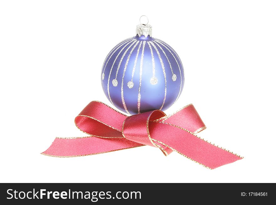 Blue Christmas ball and red ribbon bow isolated on white