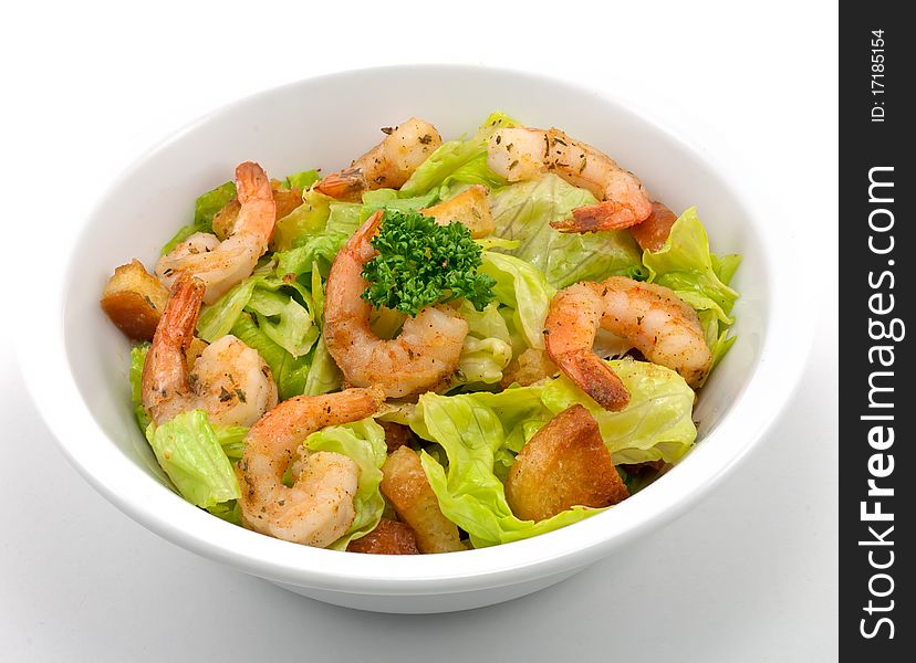 Prawn salad, with mixed greens, bread crumbs and oregano, and king-size shrimp.