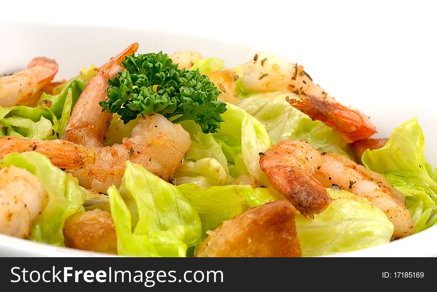 Prawn salad, with mixed greens, bread crumbs and oregano, and king-size shrimp.