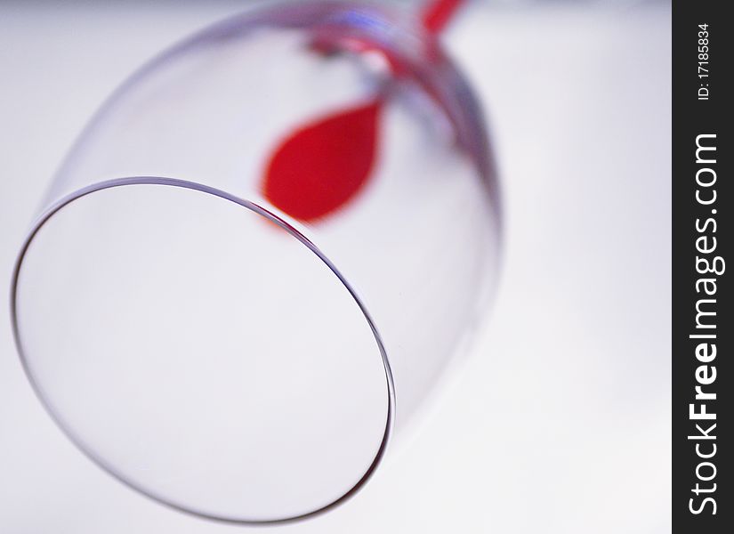Glass with a red drop