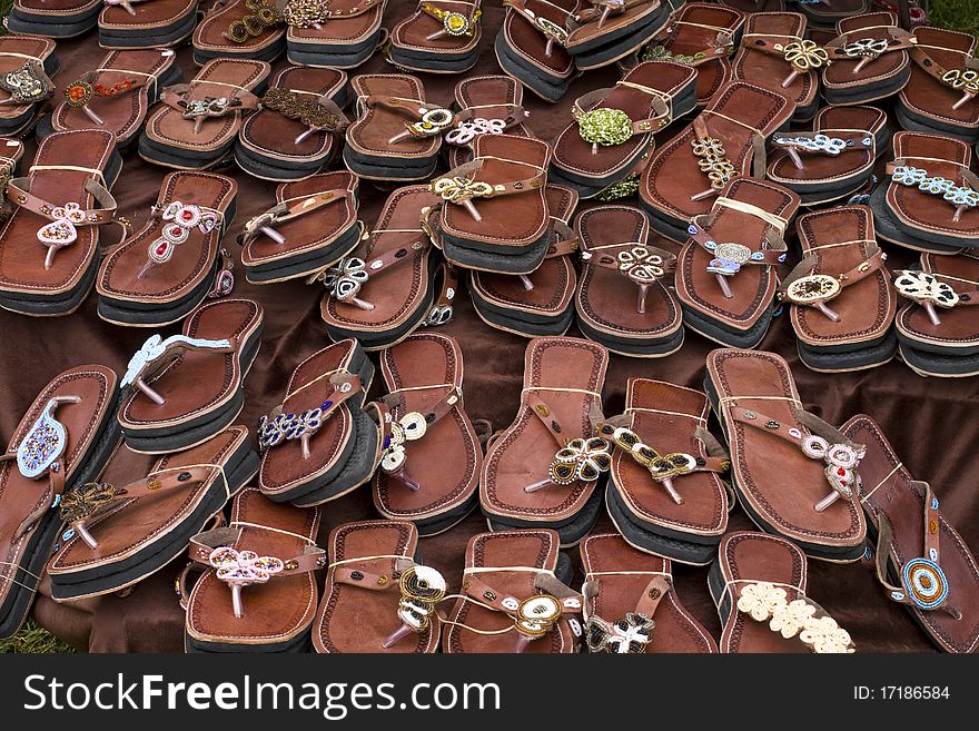 Hand made leather sandals display in a market