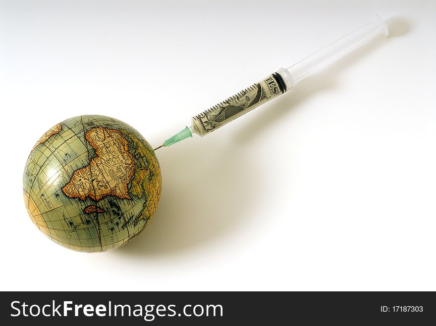 World map with a syringe. World map with a syringe