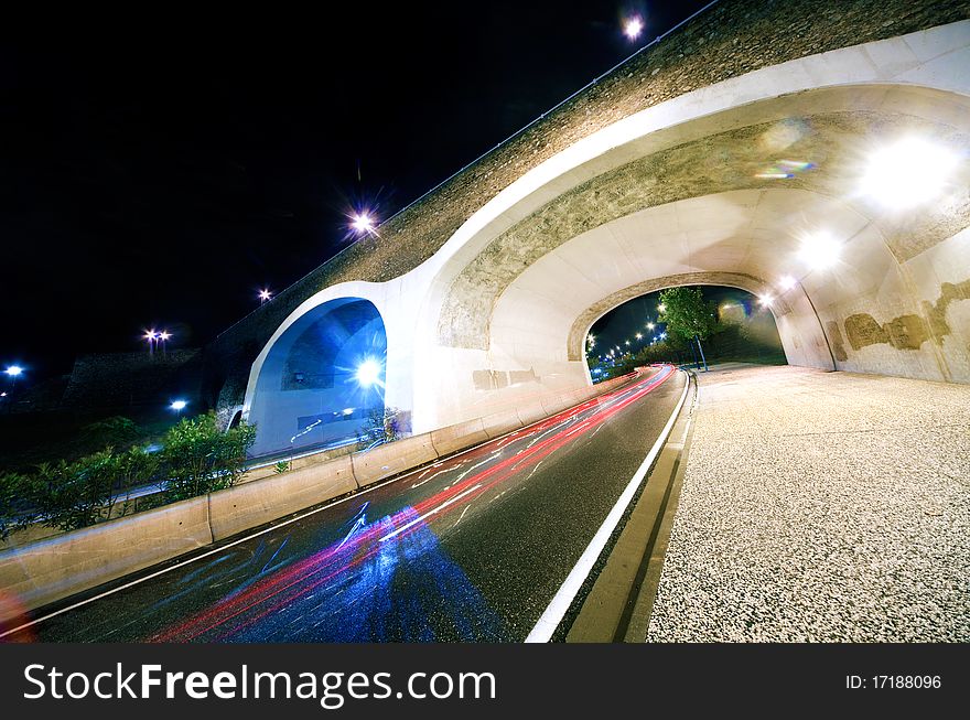 Nigth city scene with road and bridge