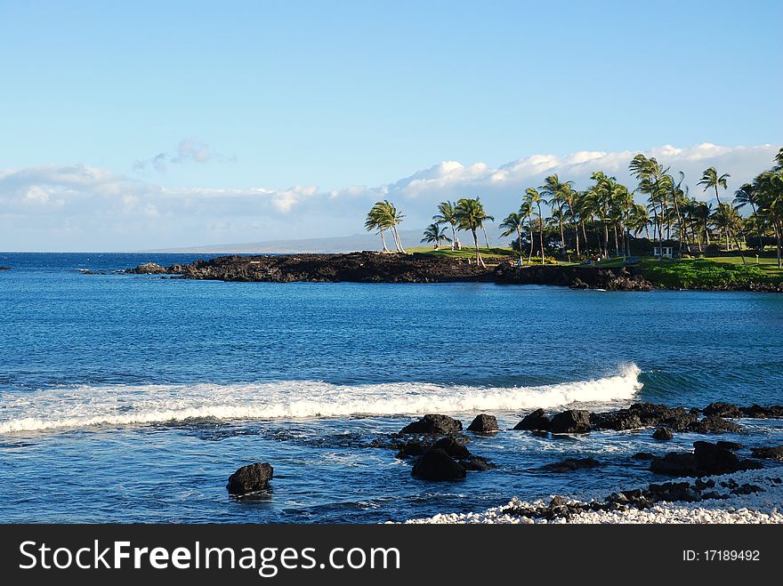 The waves wash ashore from the Pacific Ocean on the Big Island of Hawaii. The waves wash ashore from the Pacific Ocean on the Big Island of Hawaii