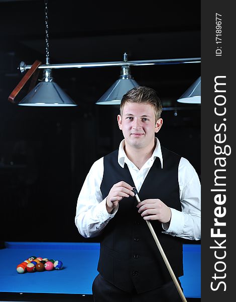 Young Man Play Pro Billiard Game