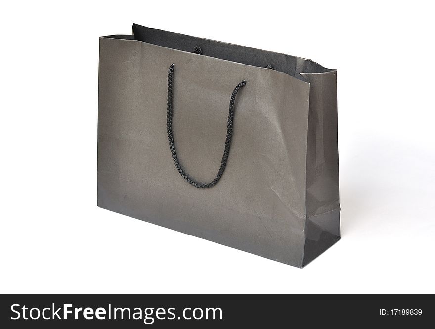 Black crumpled shopping paper bag. Black crumpled shopping paper bag.