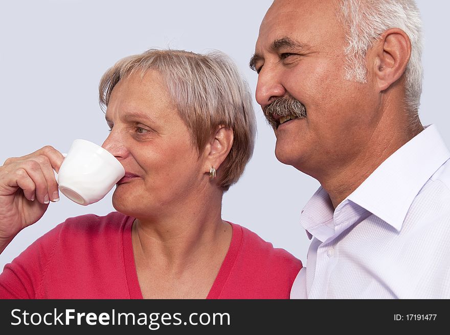 An attractive couple on a white background.