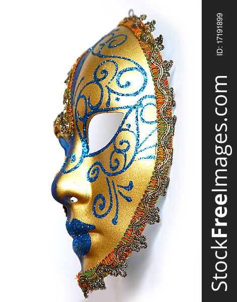 Golden blue Venitian mask on an isolated white background.