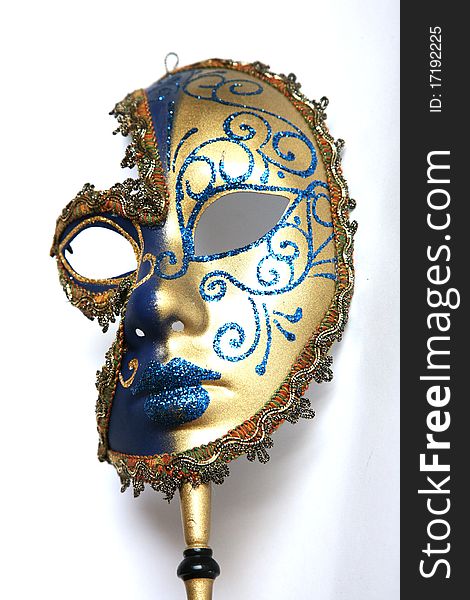 Golden  blue Venitian mask on an isolated white background.