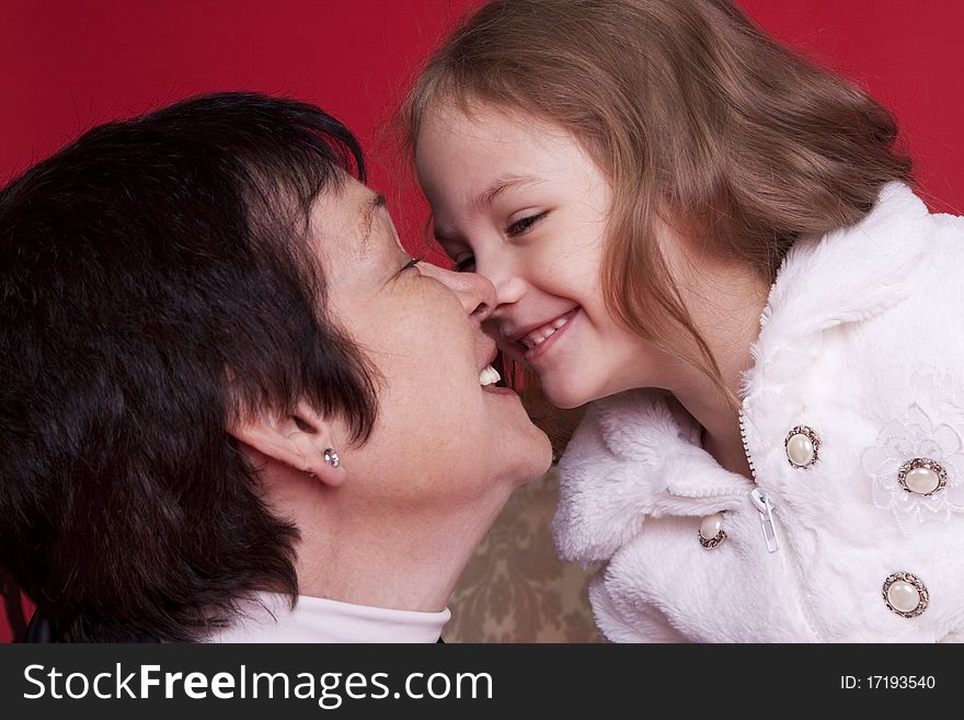Happy little girl with her grandmother