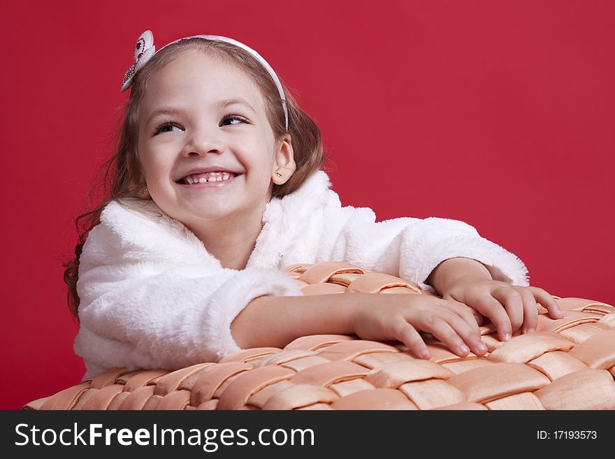 Portrait of a celebatory dressed cute happy little girl