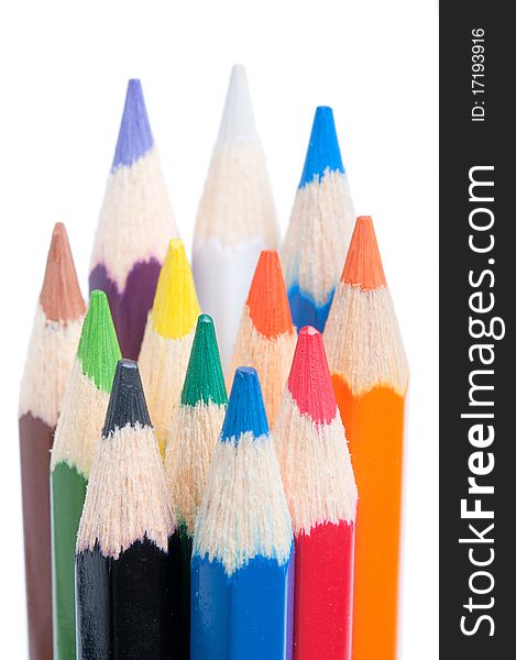Colored pencils isolated on white background, close-up. Colored pencils isolated on white background, close-up.
