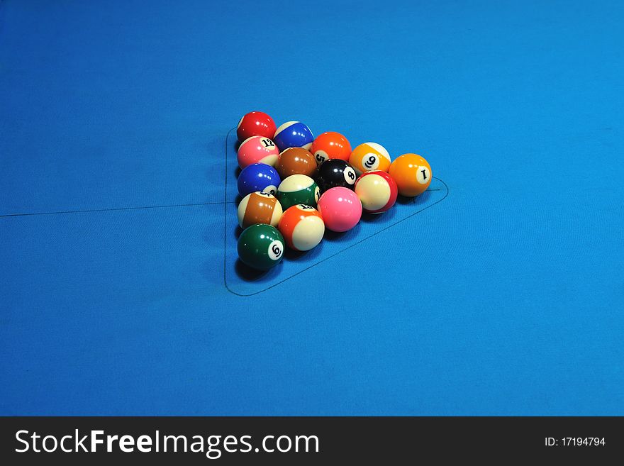 Young pro billiard player finding best solution and right angle at billard or snooker pool sport  game. Young pro billiard player finding best solution and right angle at billard or snooker pool sport  game